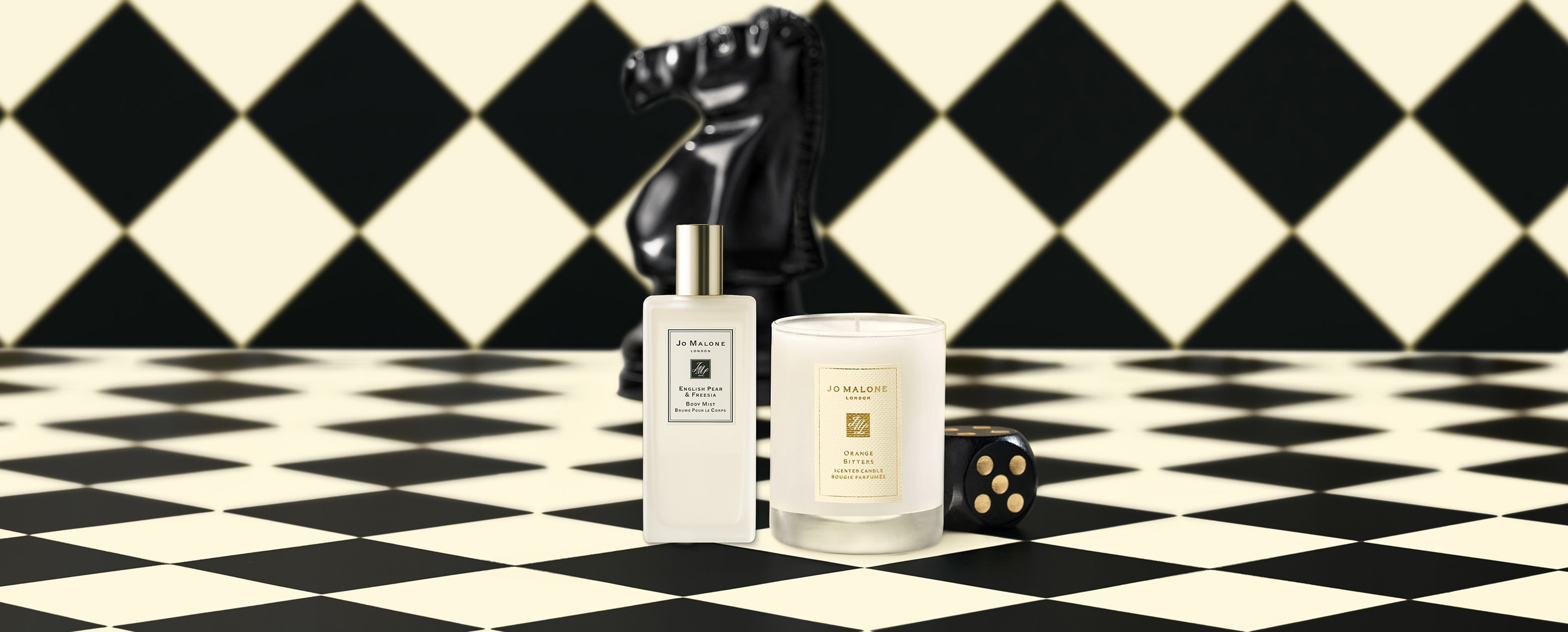 Recibe Una Travel Candle En Compras De $3,225 y Un Body Mist Adicional En Compras De $5,000